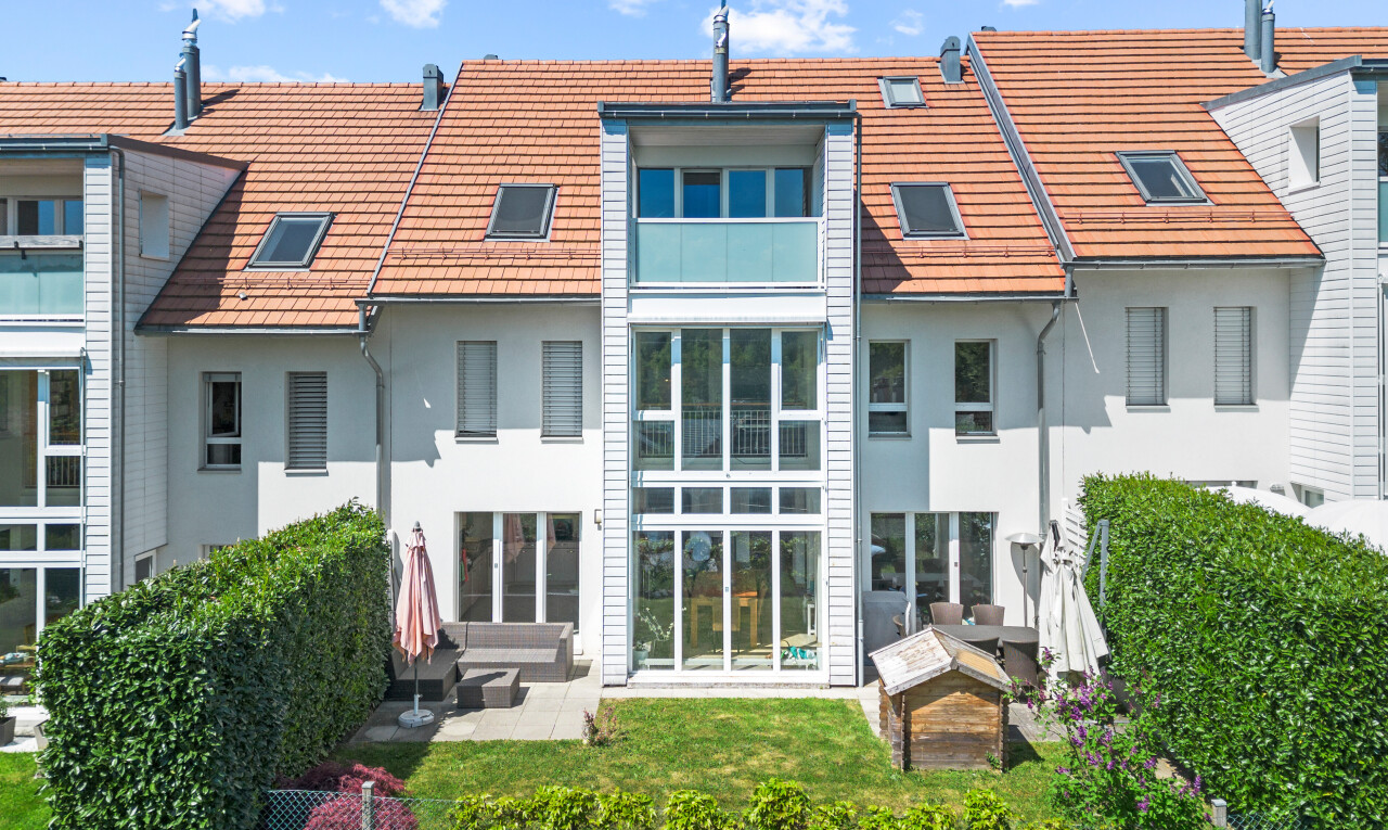 view of property featuring stucco siding and a patio