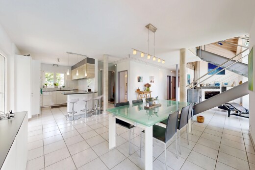 dining area with light tile patterned floors