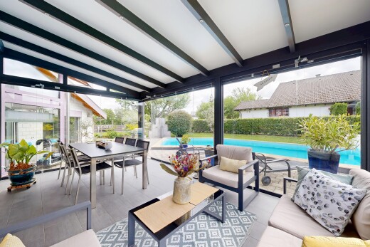 patio / terrace with a patio and an outdoor living / dining area