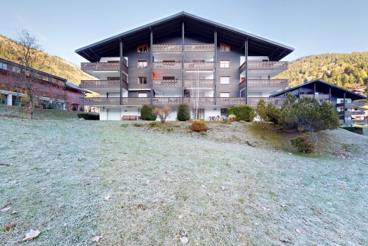extérieur du bâtiment avec day time, mountain view, vue sur la montagne, et property visible