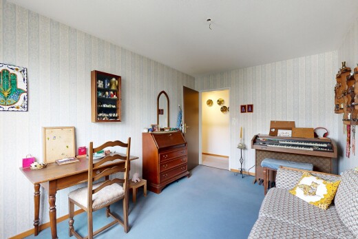 zimmer / schlafzimmer mit carpet, teppich, inside property, und bürobereich