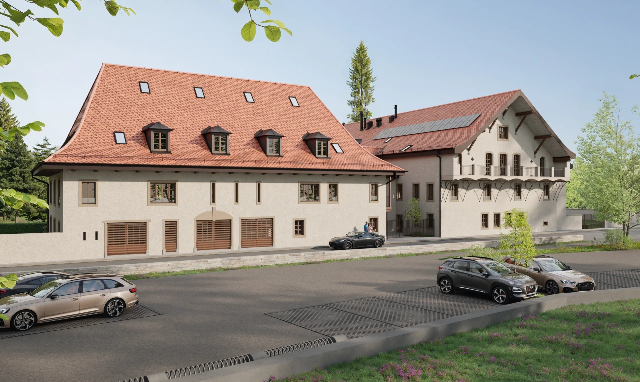 façade avec bardage en stuc et toit mansardé