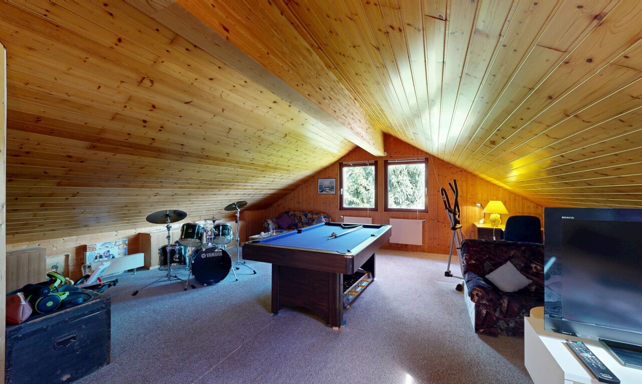 room / bedroom with billiards table, wooden walls, wood ceiling, and carpet flooring