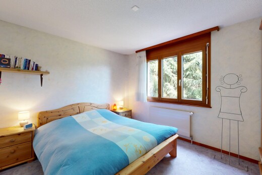 chambre avec radiateur, carpet, moquette, drywall, et cloison sèche
