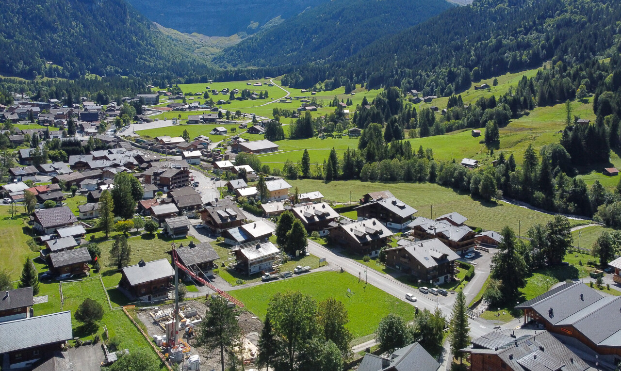 view of mountain background with nearby suburban area