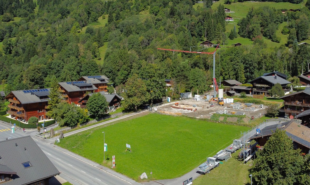 view of property with a forest view