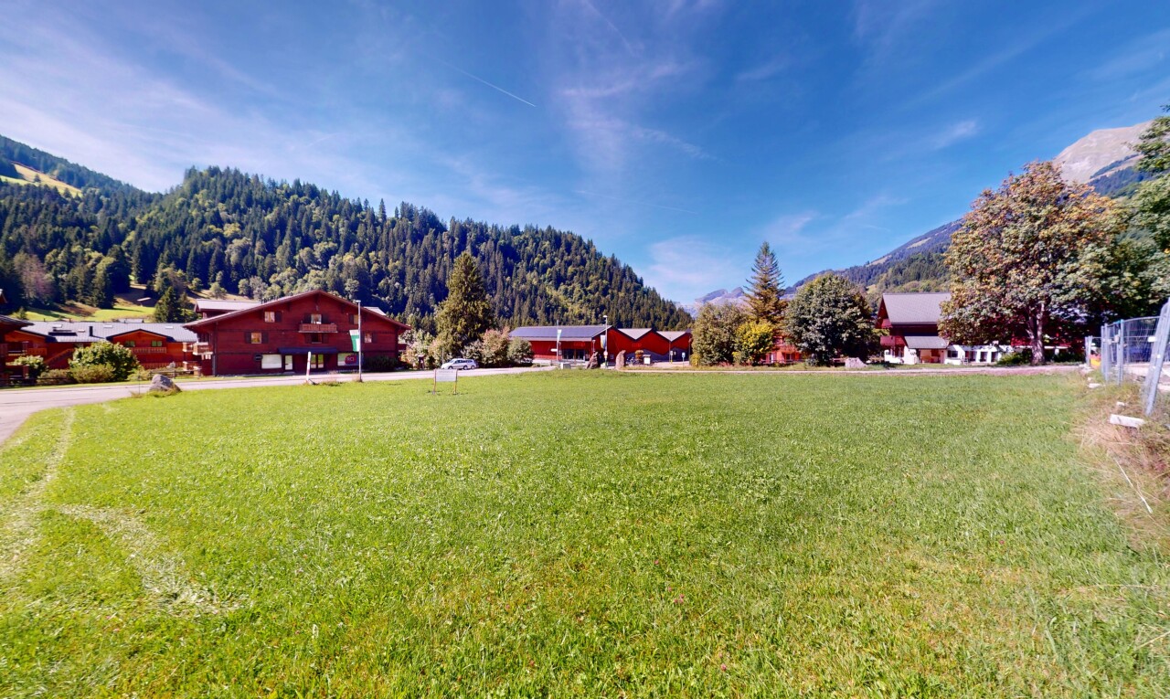 garden featuring a mountain view and a lawn