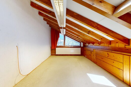 zimmer / schlafzimmer mit beamed ceiling, balkendecke, zusätzliches zimmer, vaulted ceiling, und dachschräge