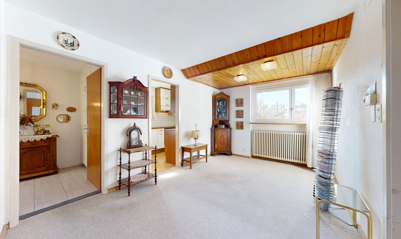 wohnzimmer mit kühler, carpet, teppich, inside property, und drywall
