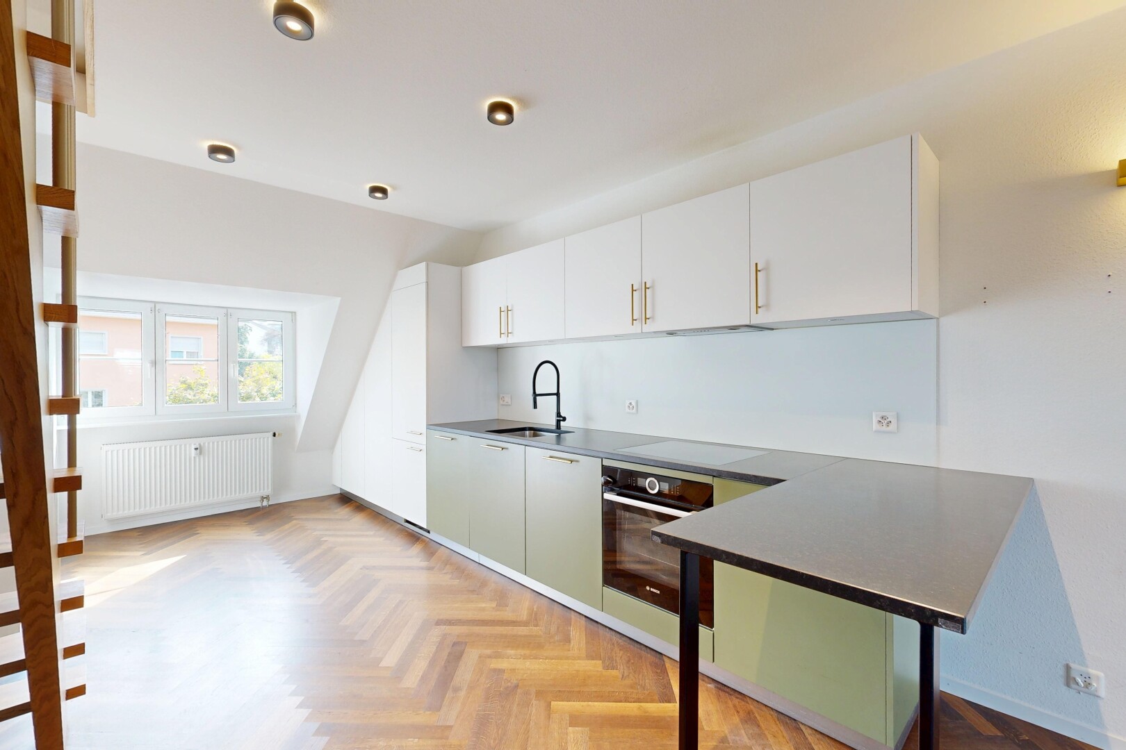 cuisine avec parquet floor, armoires blanches, radiateur, four, et inside property