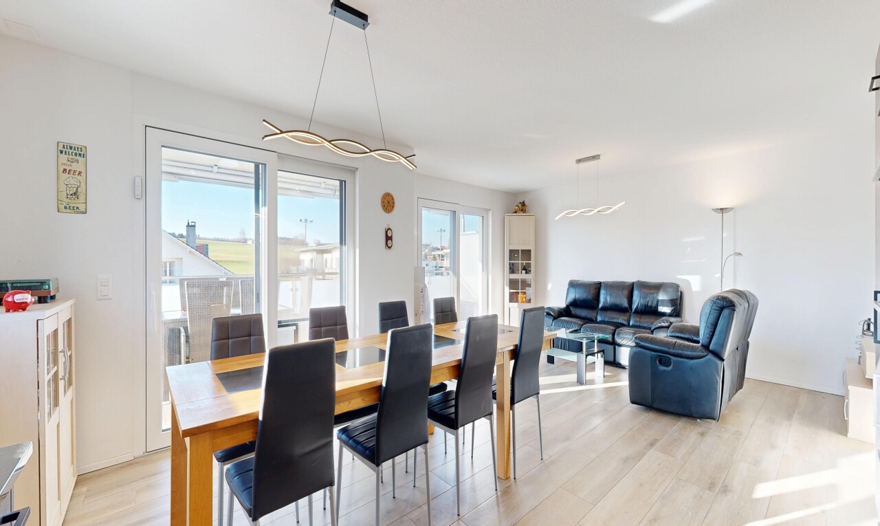living / dining area with light wood-type flooring