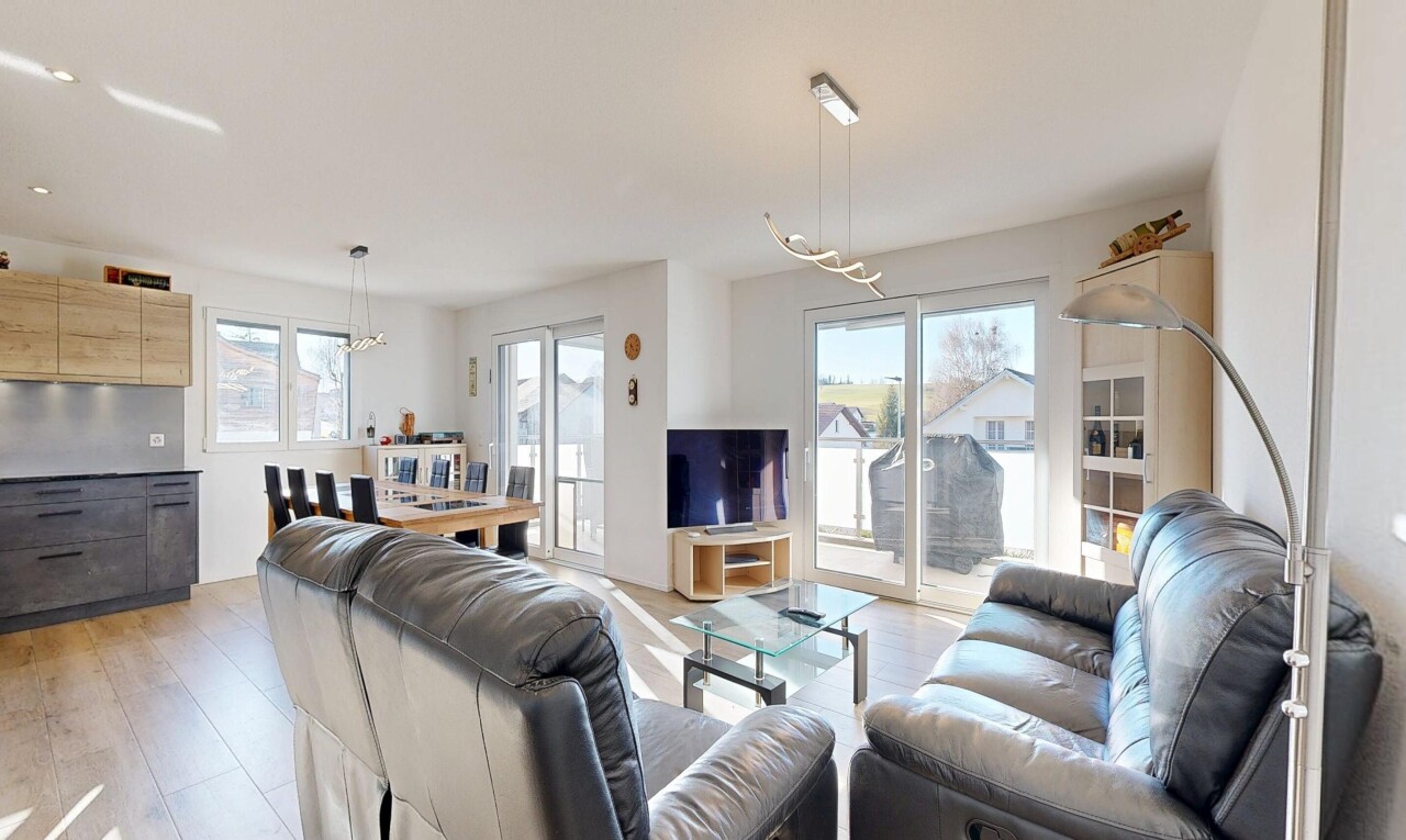living / dining room with light wood-style flooring