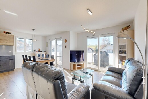living / dining room with light wood-style flooring