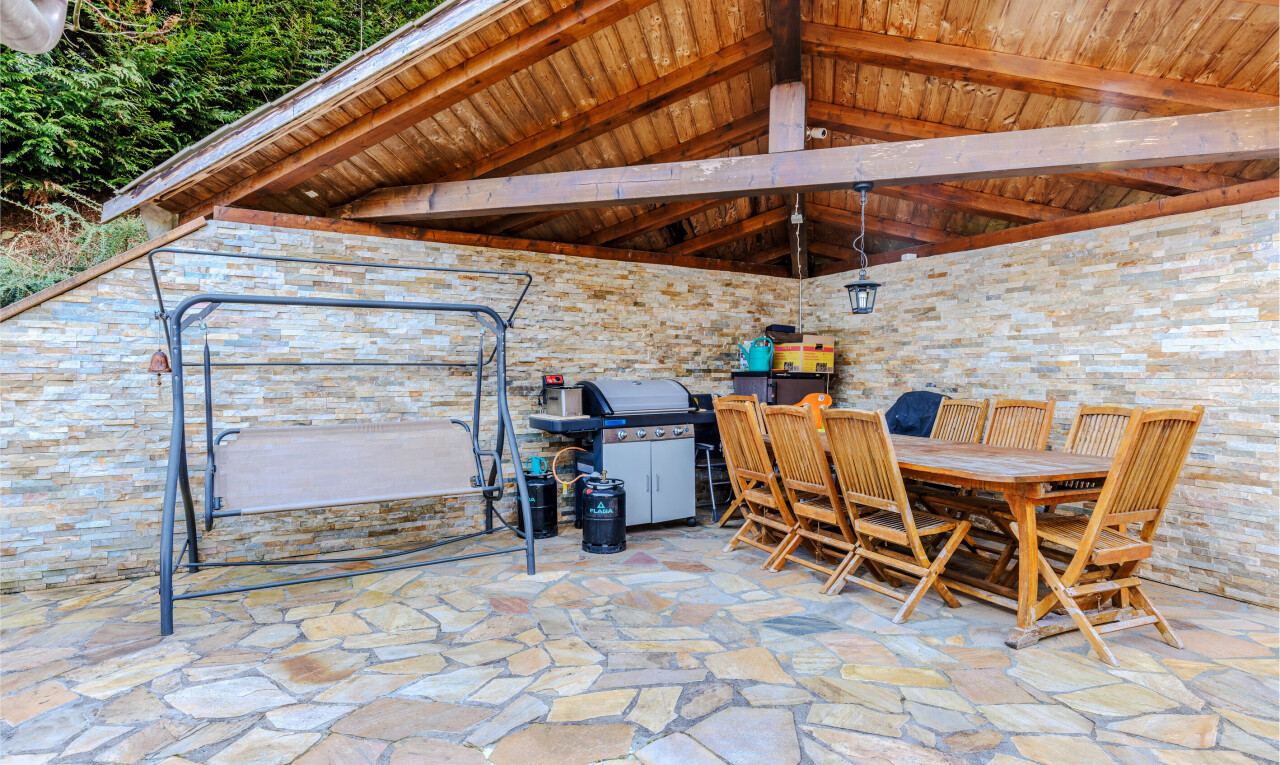 patio / terrace featuring a grill, outdoor dining area, and a patio area