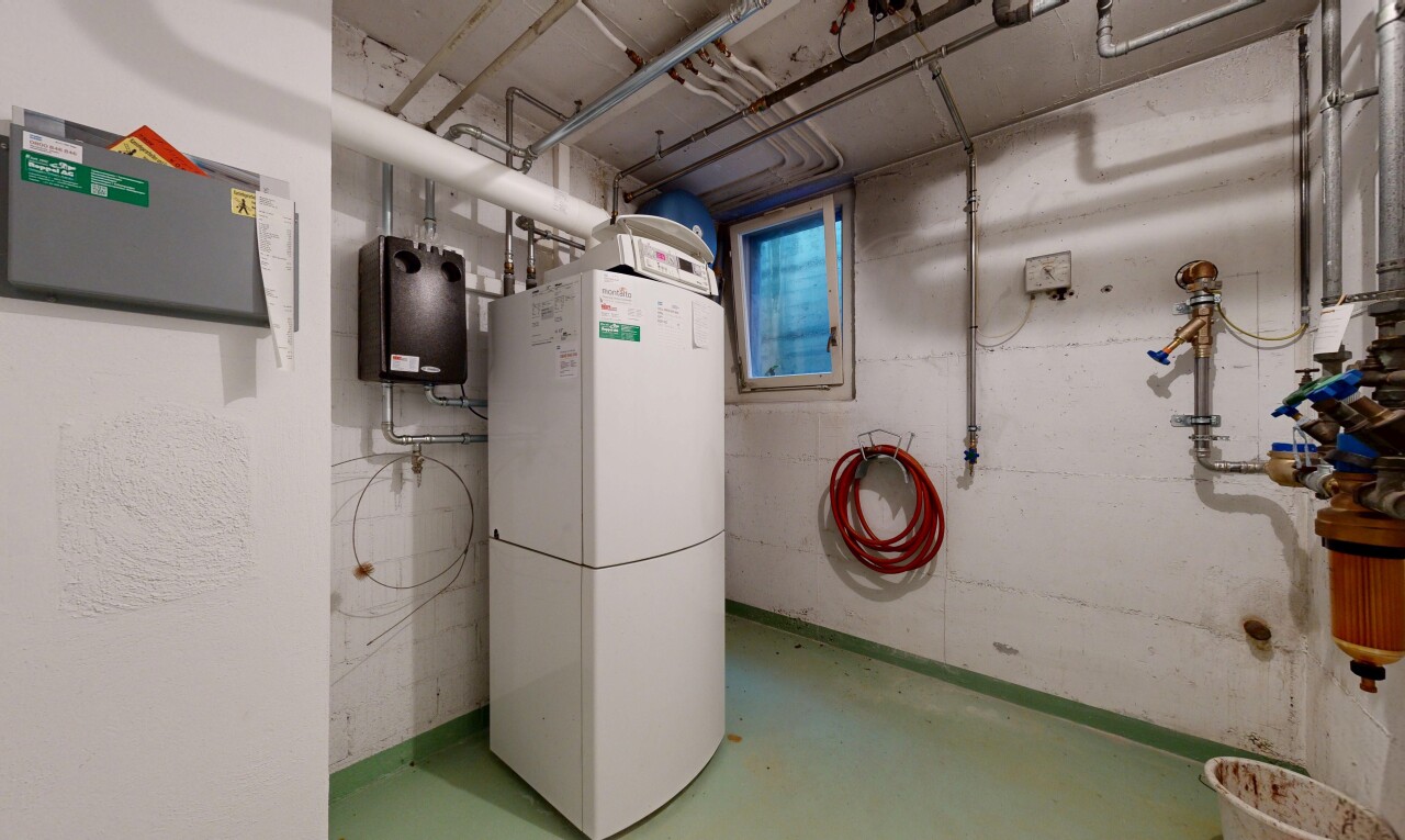 buanderie avec concrete floor, inside community, et sous-sol