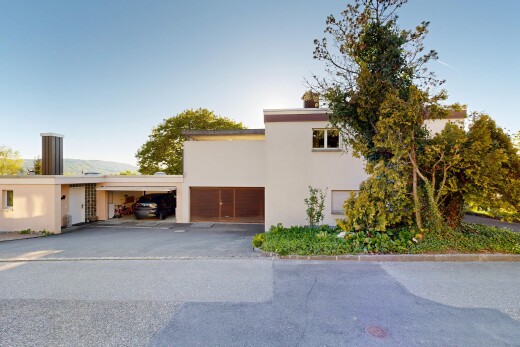 außenansicht mit garage, stuckverkleidung, auffahrt, day time, und carport angeschlossen