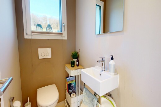 half bathroom featuring a sink