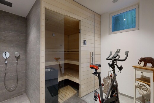 workout area featuring a relaxing sauna