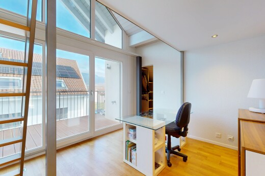 office space featuring light wood-type flooring and baseboards