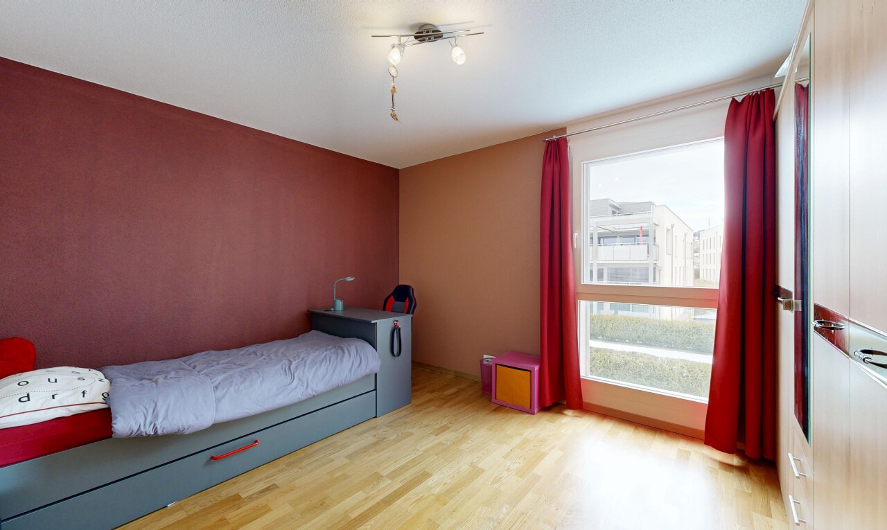 room / bedroom featuring light wood-style flooring