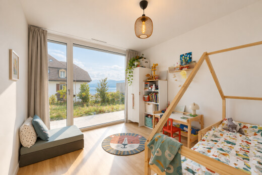 room / bedroom with access to outside, light wood-style flooring, and floor to ceiling windows