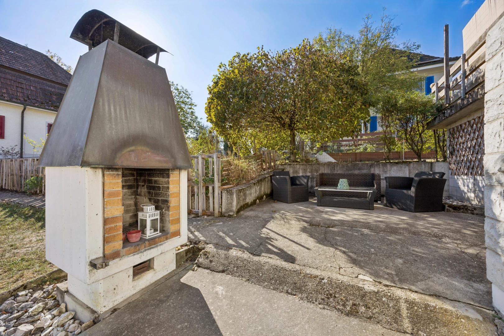 terrace featuring a fenced backyard, a patio, and an outdoor hangout area