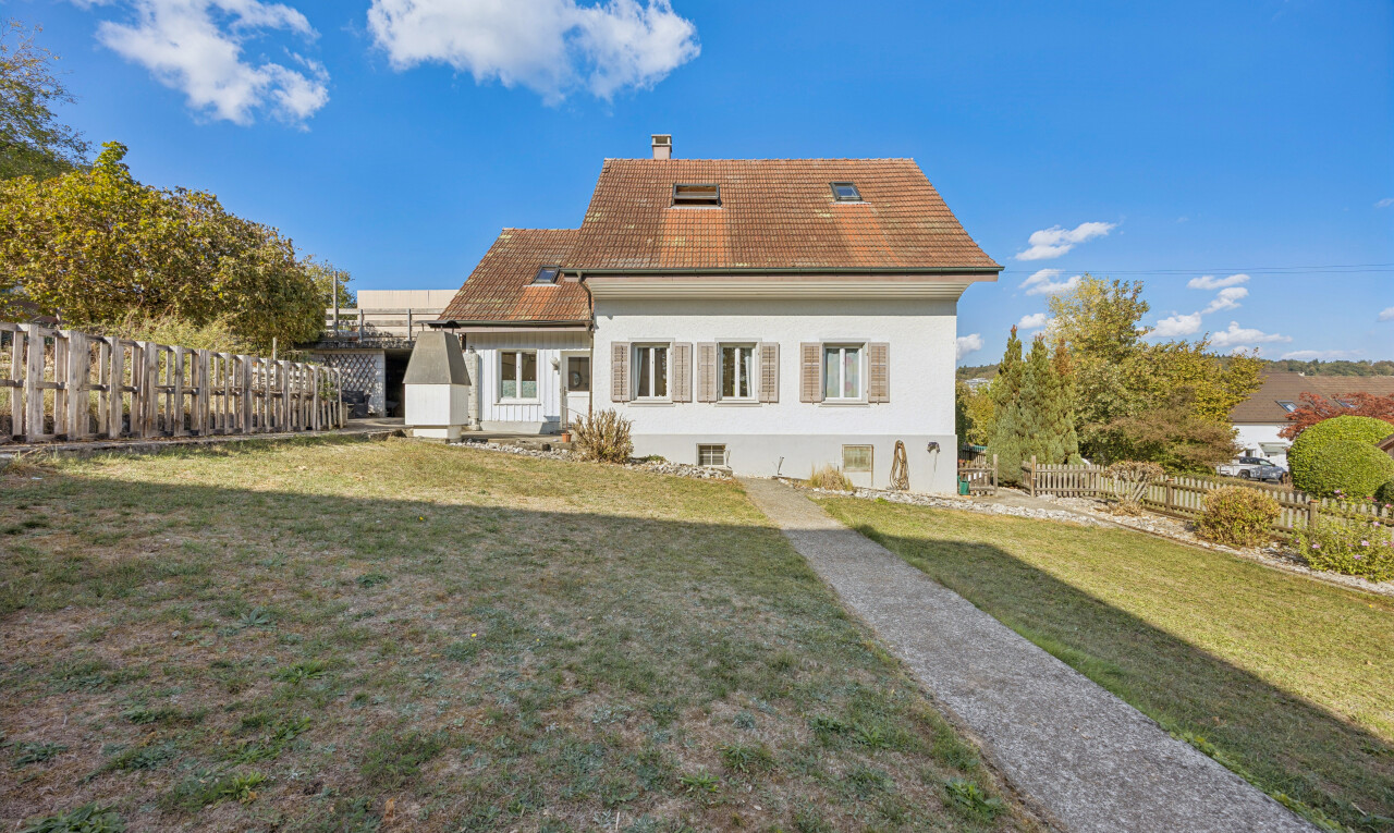 outdoor house with a fenced backyard