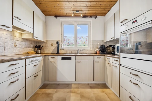 kitchen with white appliances, backsplash, wood ceiling, dark countertops, and light tile patterned floors