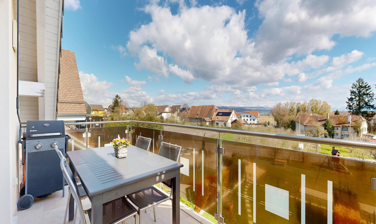 balcony featuring a residential view, grilling area, and outdoor dining area