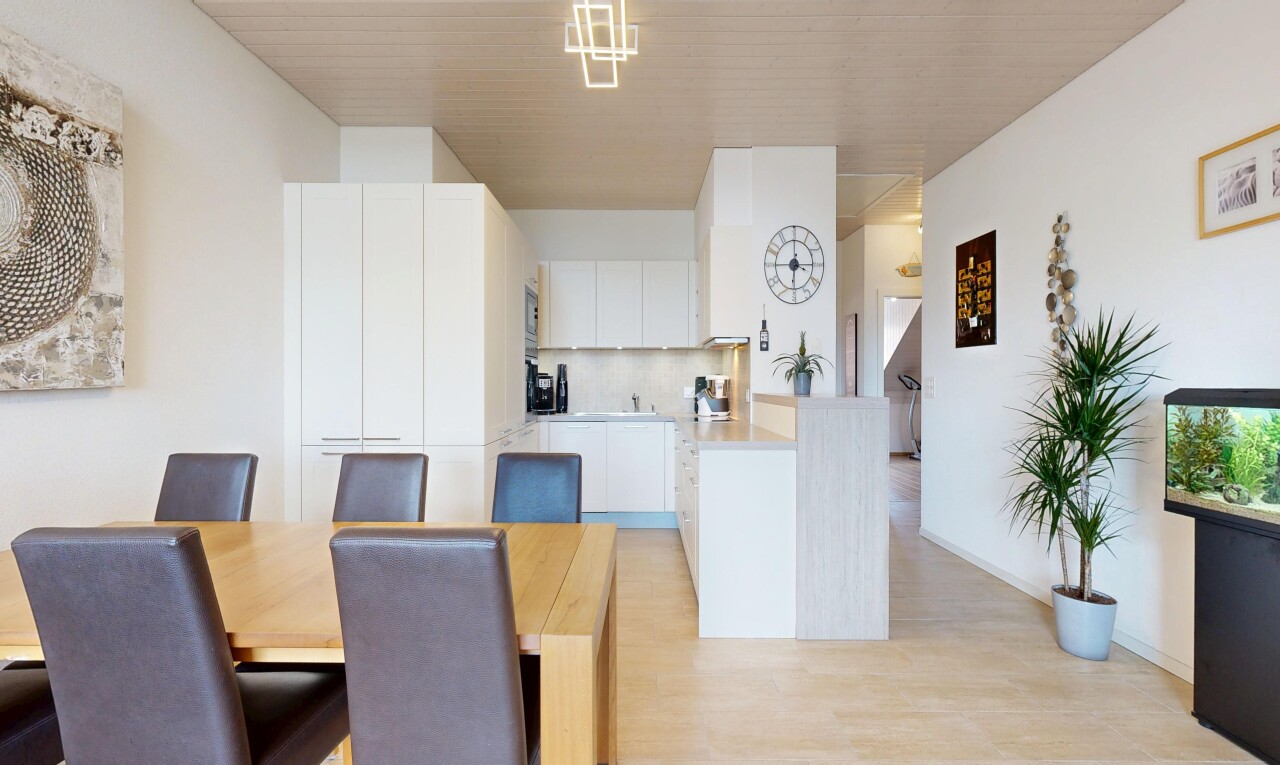 dining area with light wood-style flooring