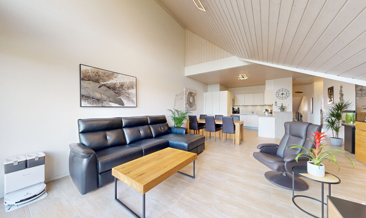 living room featuring a high wood ceiling
