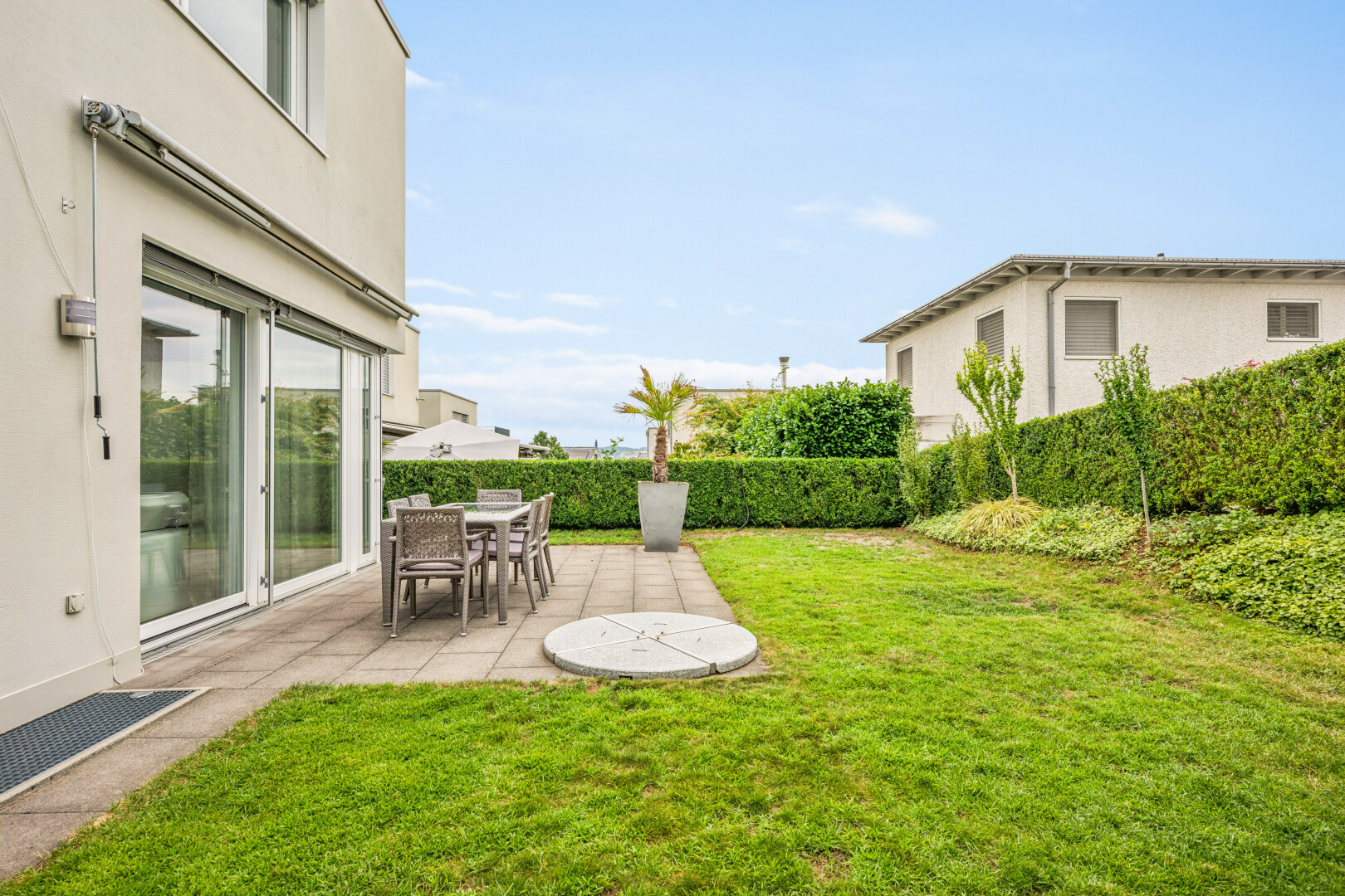 garden featuring a patio and outdoor dining space