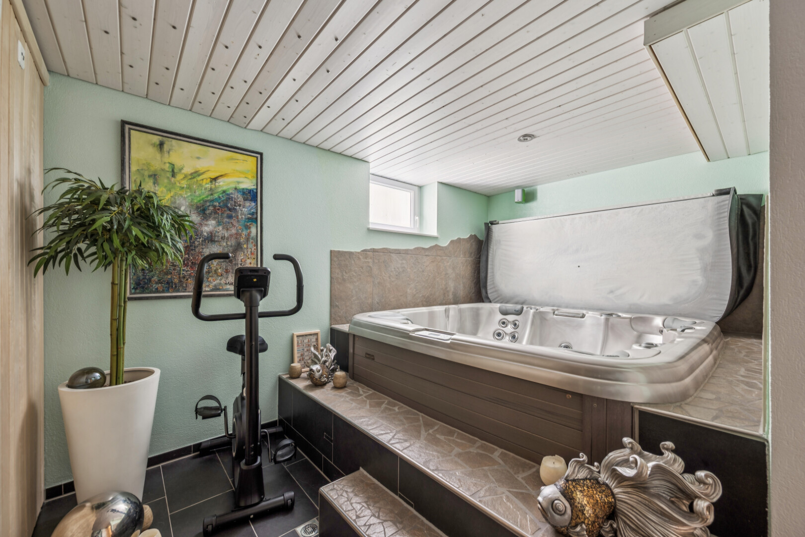 detailed view of a whirlpool tub and wooden ceiling