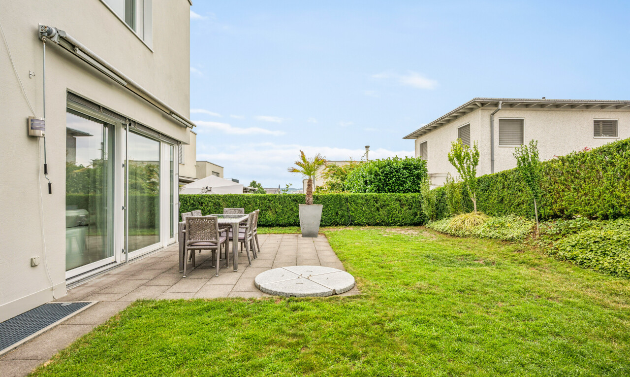 garden featuring a patio and outdoor dining space