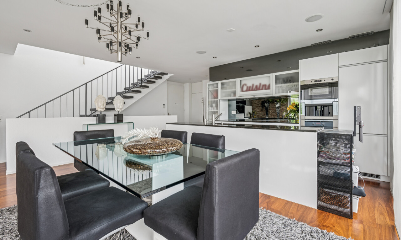 dining space featuring light wood finished floors and recessed lighting