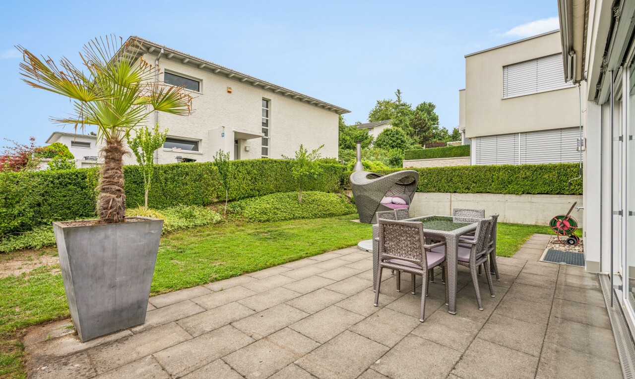 terrace featuring outdoor dining area and a patio