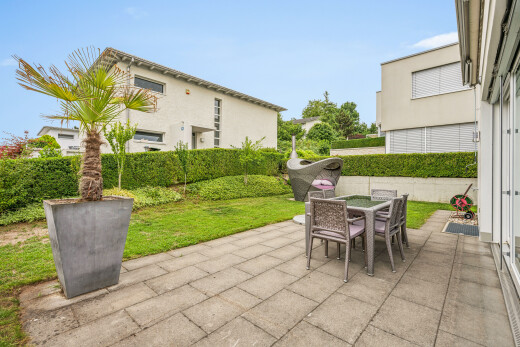terrace featuring outdoor dining area and a patio