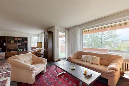 salon avec accès à l'extérieur, radiateur, et inside property