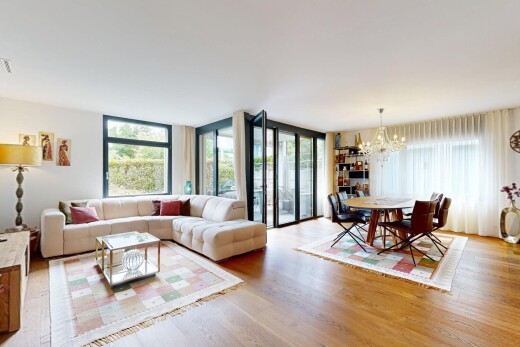 living / dining room featuring light wood finished floors and floor to ceiling windows