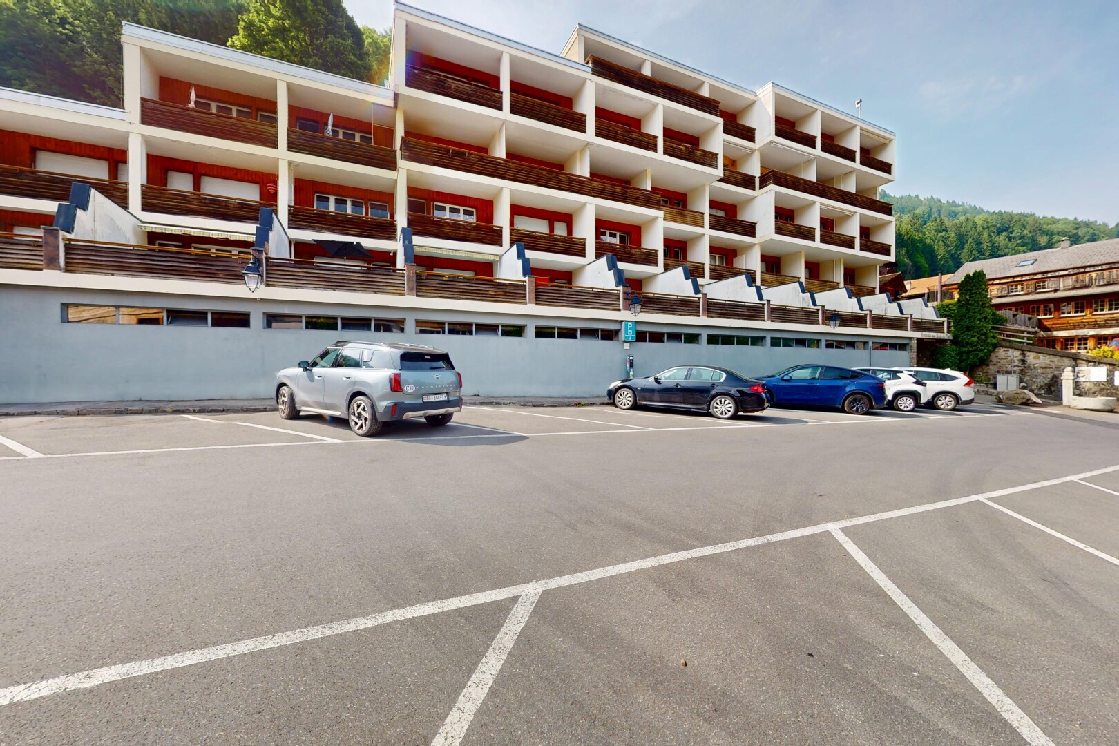 view of property with uncovered parking