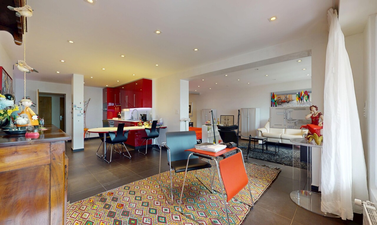 tiled living room with recessed lighting