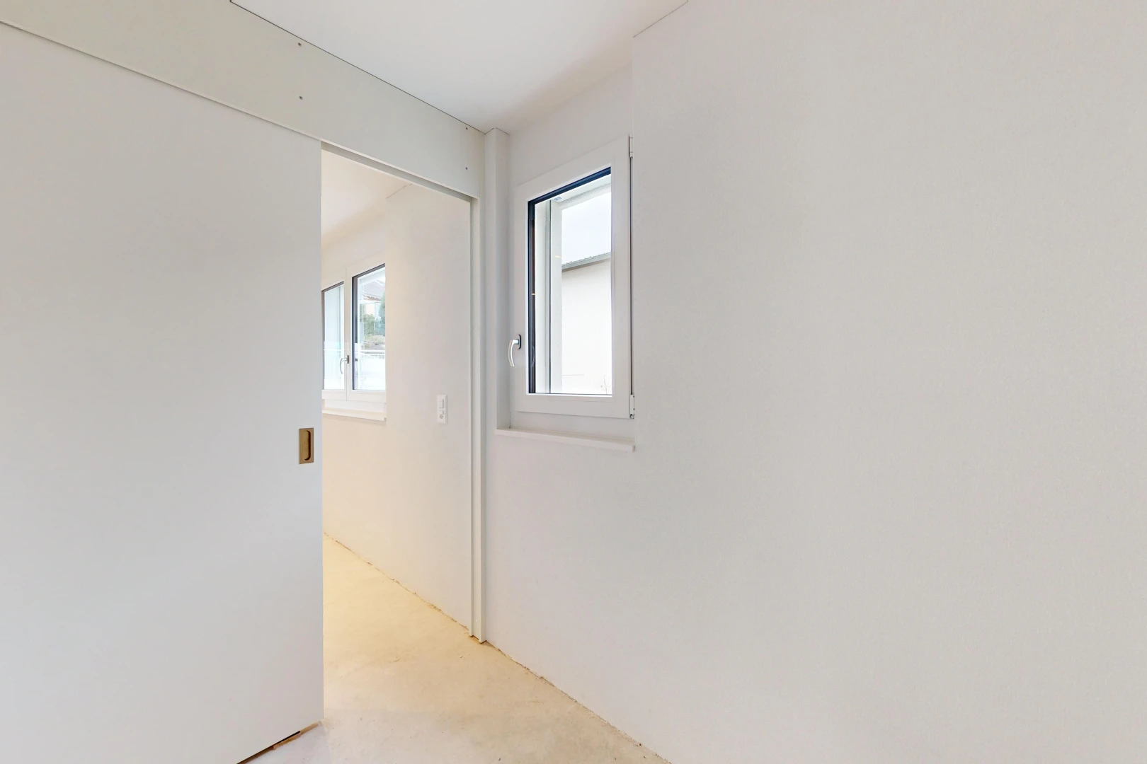 empty room featuring light colored carpet