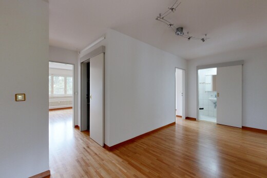 leerer raum mit natürliches licht, natural light, holzfußboden, wood finish floor, und inside property