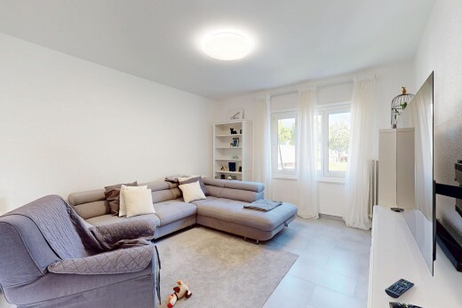 living room featuring light floors