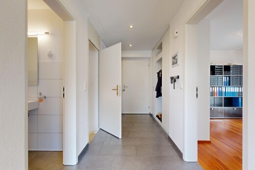 halle / korridor mit inside property, gipskartonwand, drywall, einbauleuchten, und recessed lighting