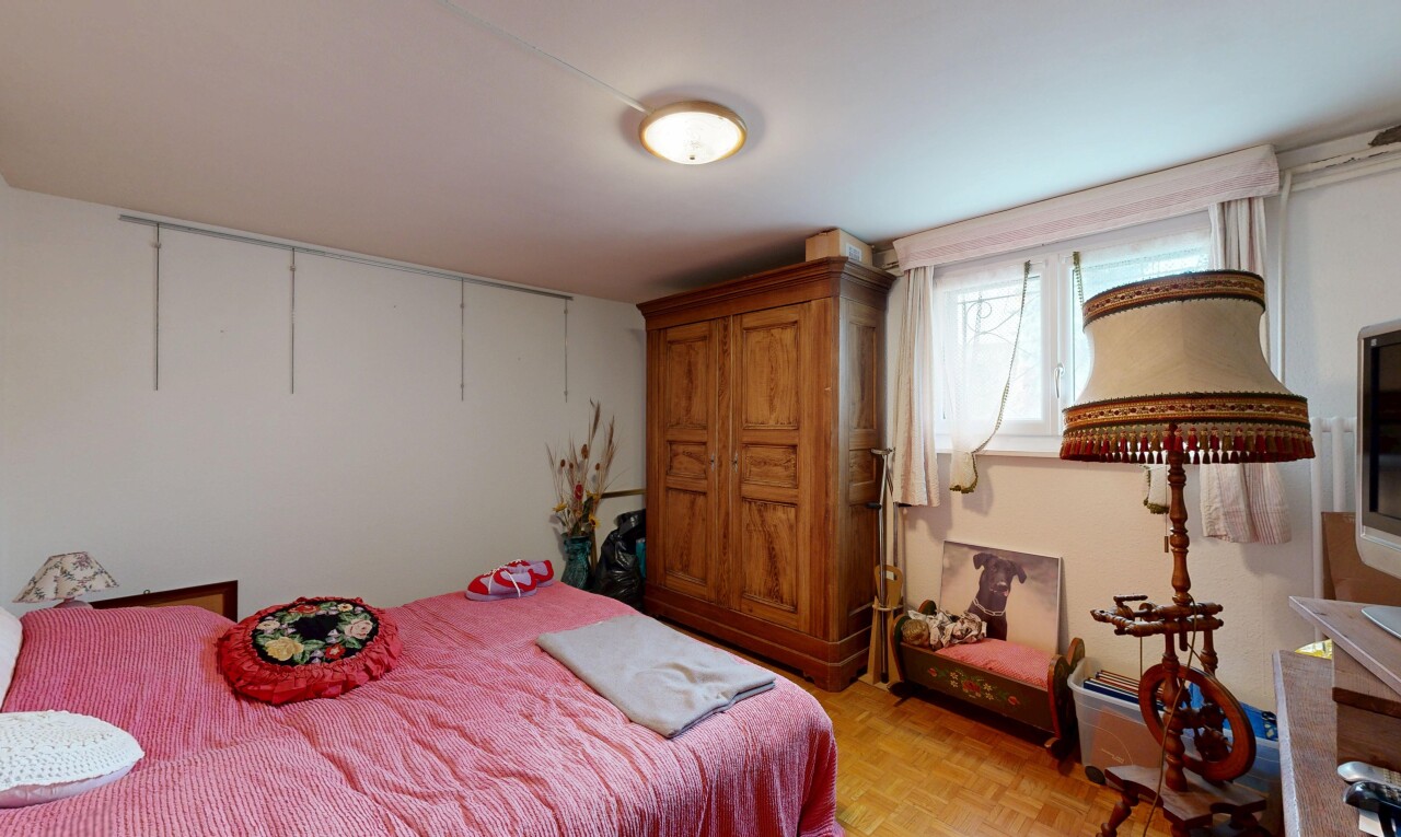room / bedroom featuring parquet floors