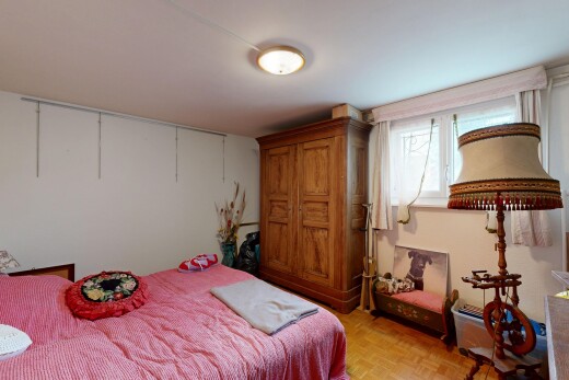 room / bedroom featuring parquet floors