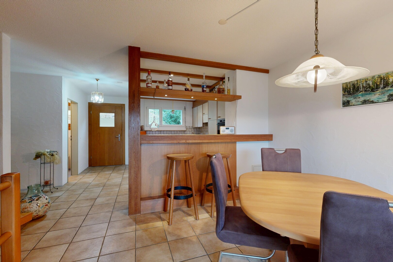 dining area featuring light tile patterned floors