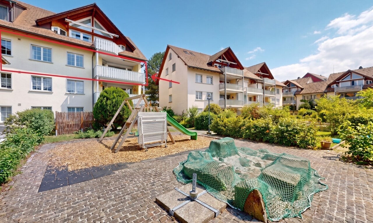 außenansicht mit from community, apartment complex view, spielplatz, day time, und dachgaube