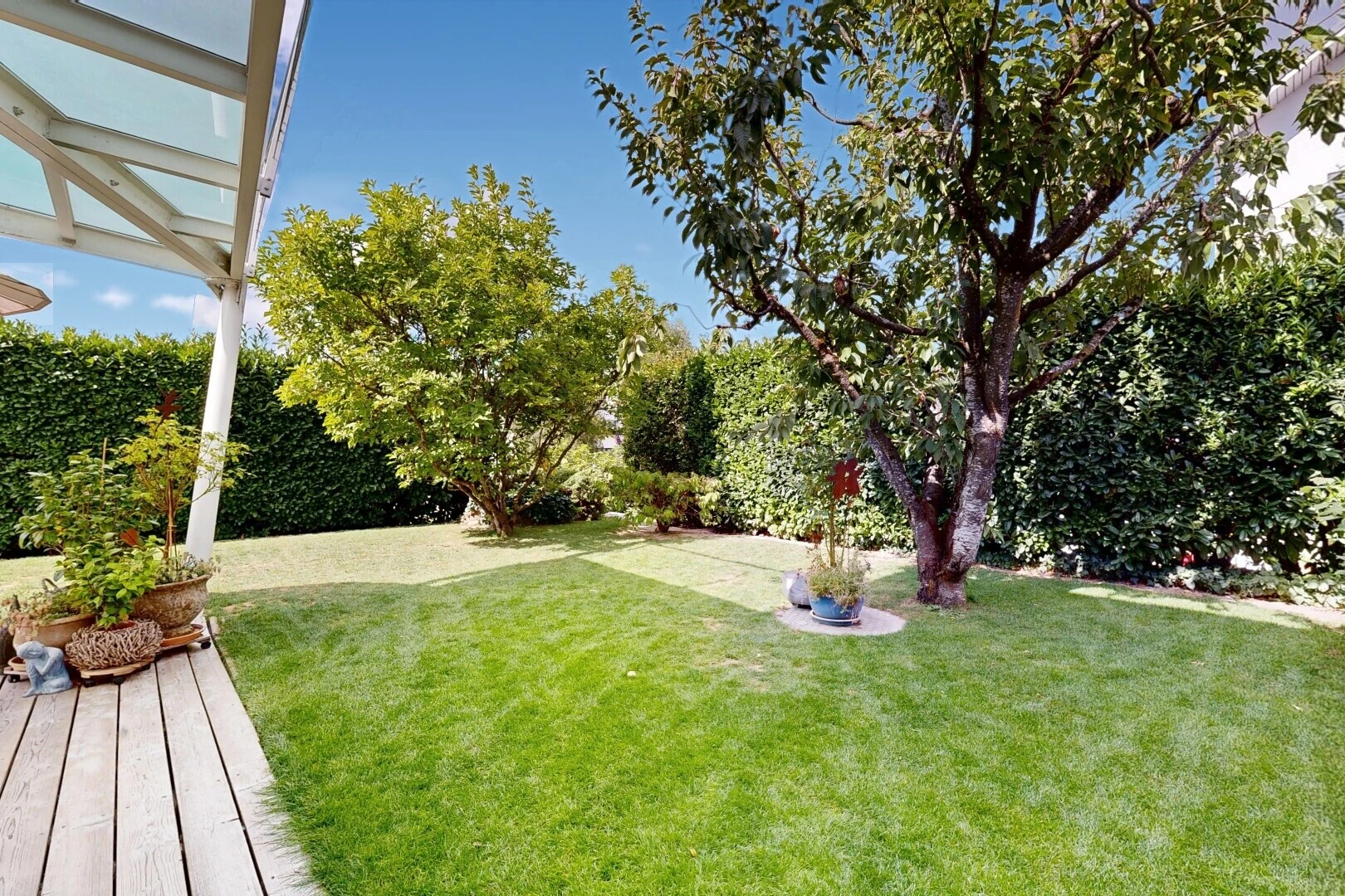 garden featuring a yard and a deck